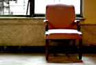 Chair in the grand lobby of 1075 Grand Concourse, once called The Farragut.